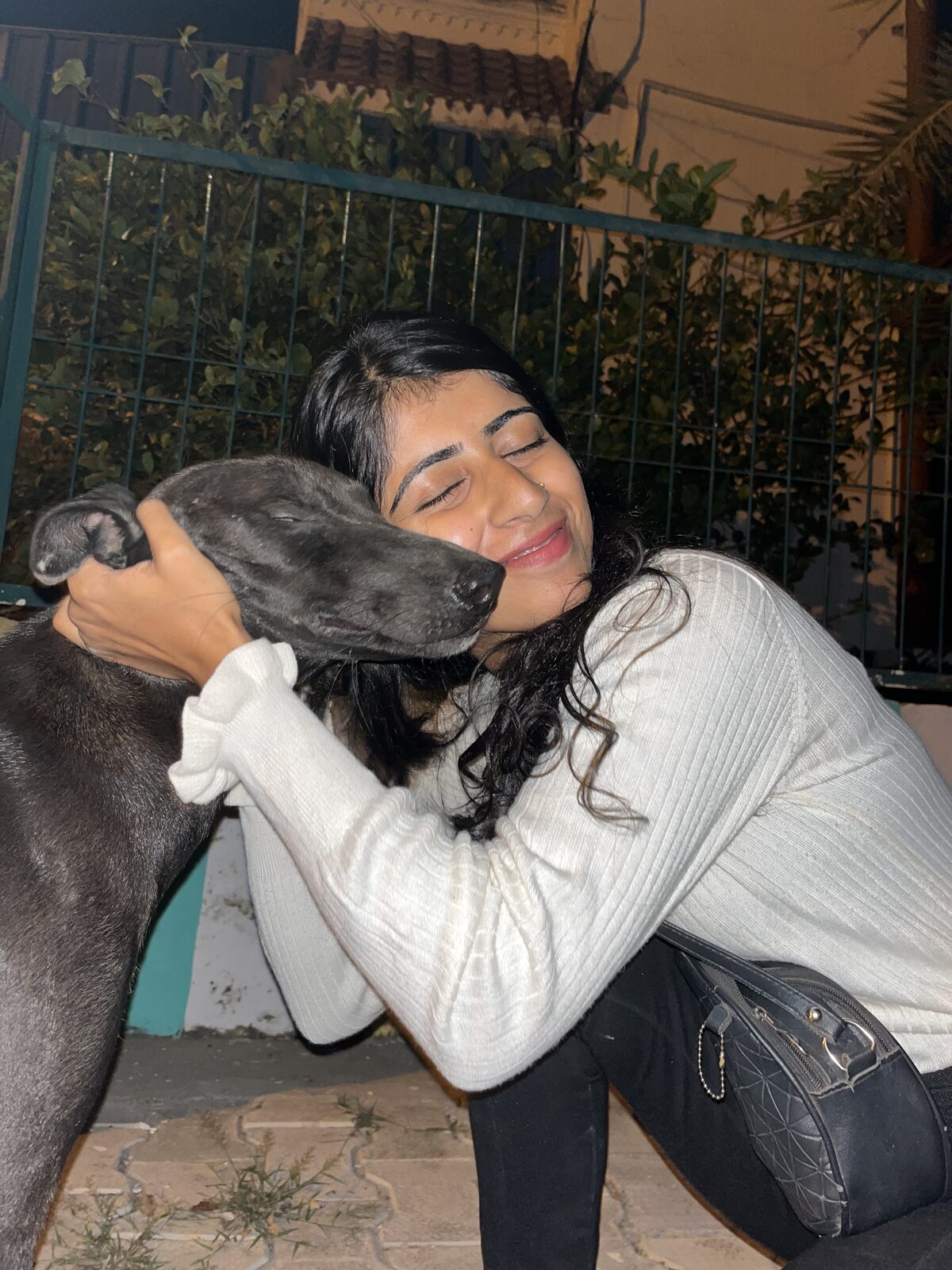 Suhani with a rescued puppy