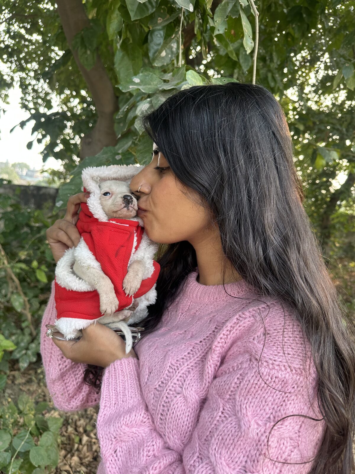 Suhani with a rescued puppy
