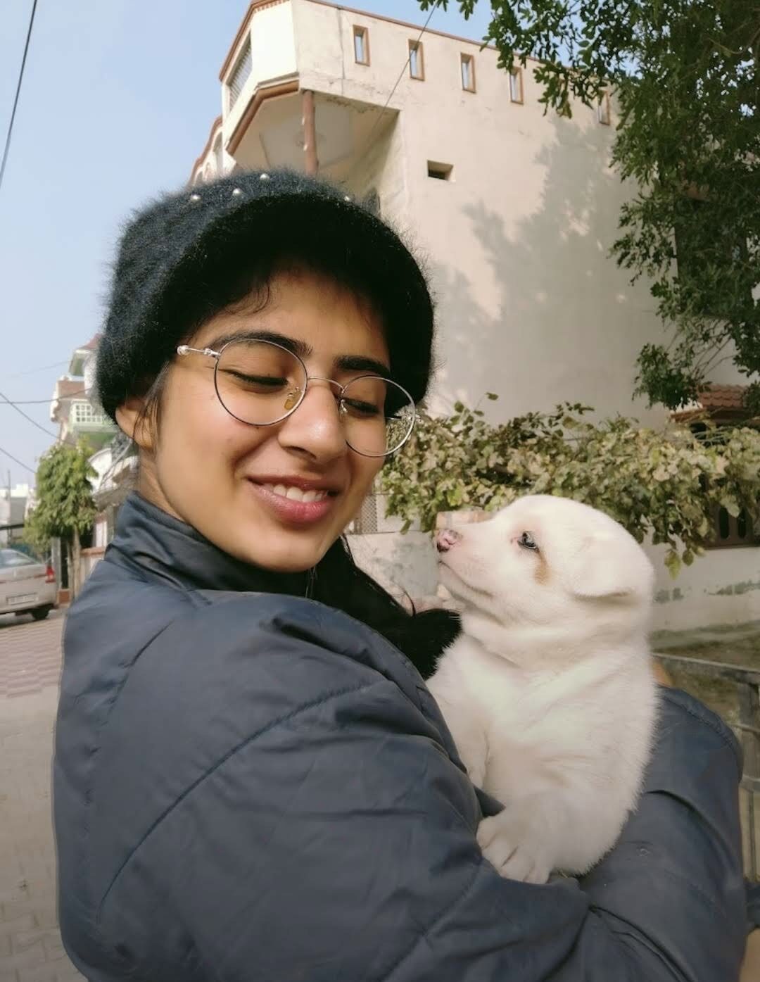 Suhani with a street puppy she rescued